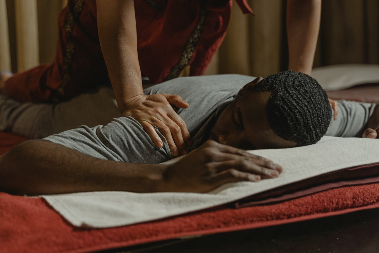 cta-01 A serene spa setting featuring a massage therapy session for relaxation and rejuvenation.